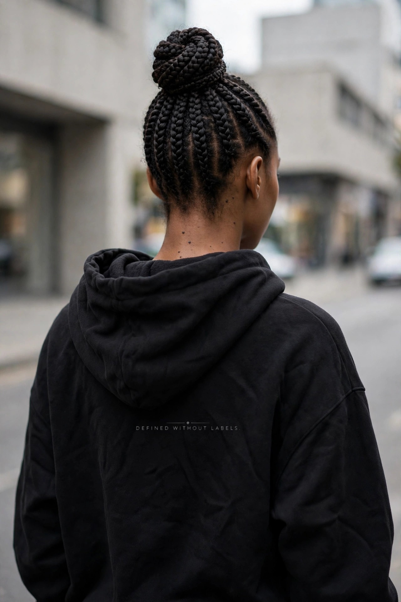 Hoodie, back view, with Defined Without Labels. on the back.
